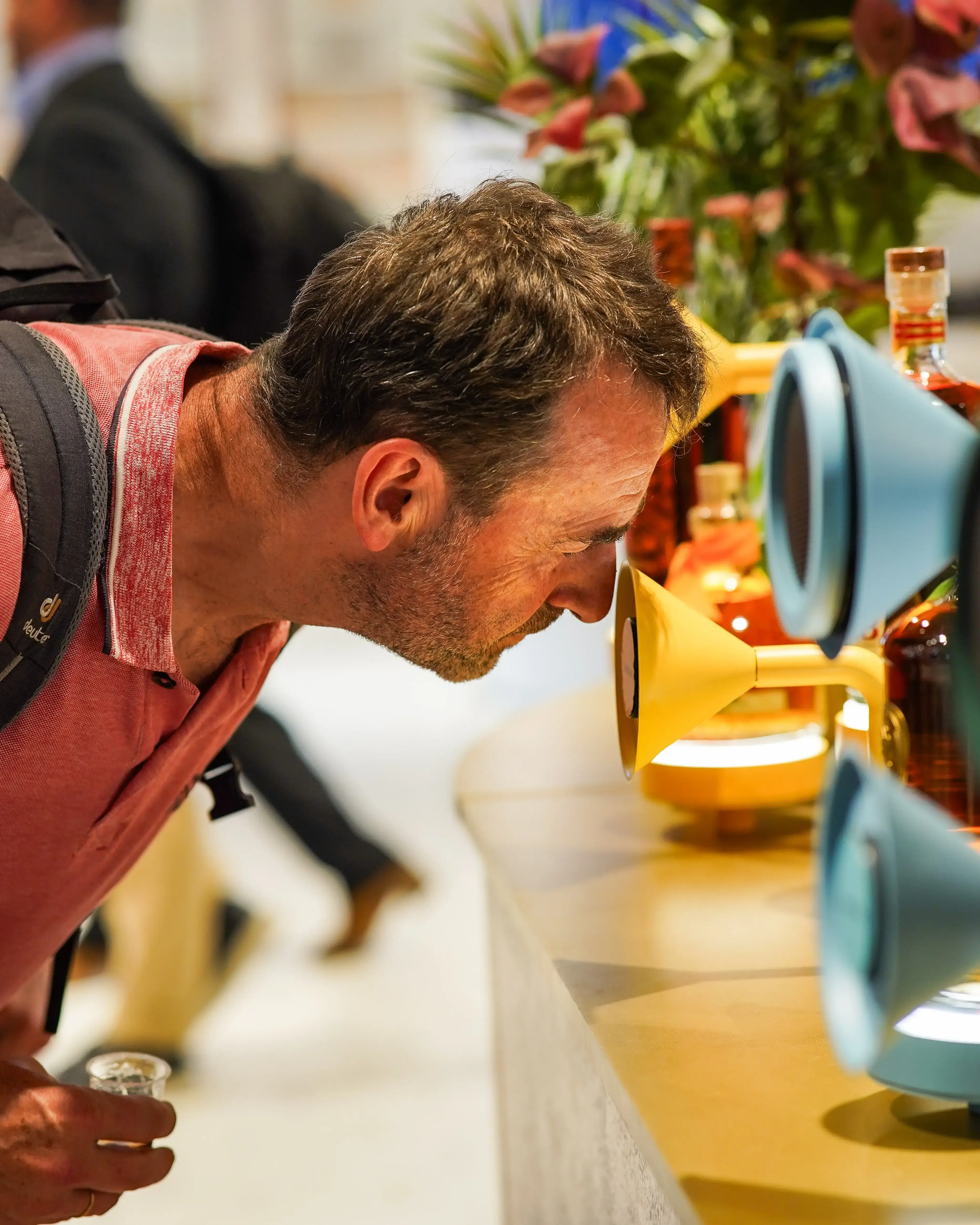 Man smelling the rum